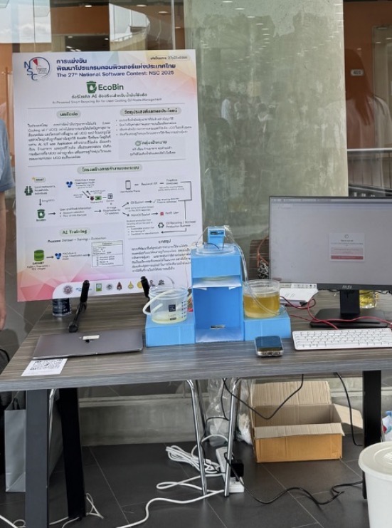 Judges reviewing the EcoBin poster and prototype at the National Software Contest 2025